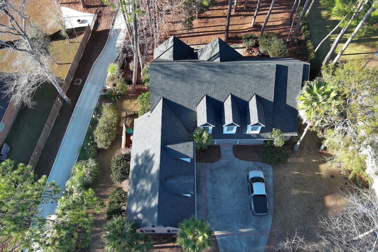A multi-dormer roof replacement completed in Rincon, GA.