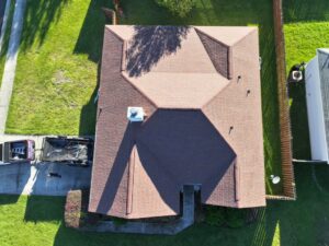 After the completed roof with Atlas Pinnacle Pristine shingles in Sunset.